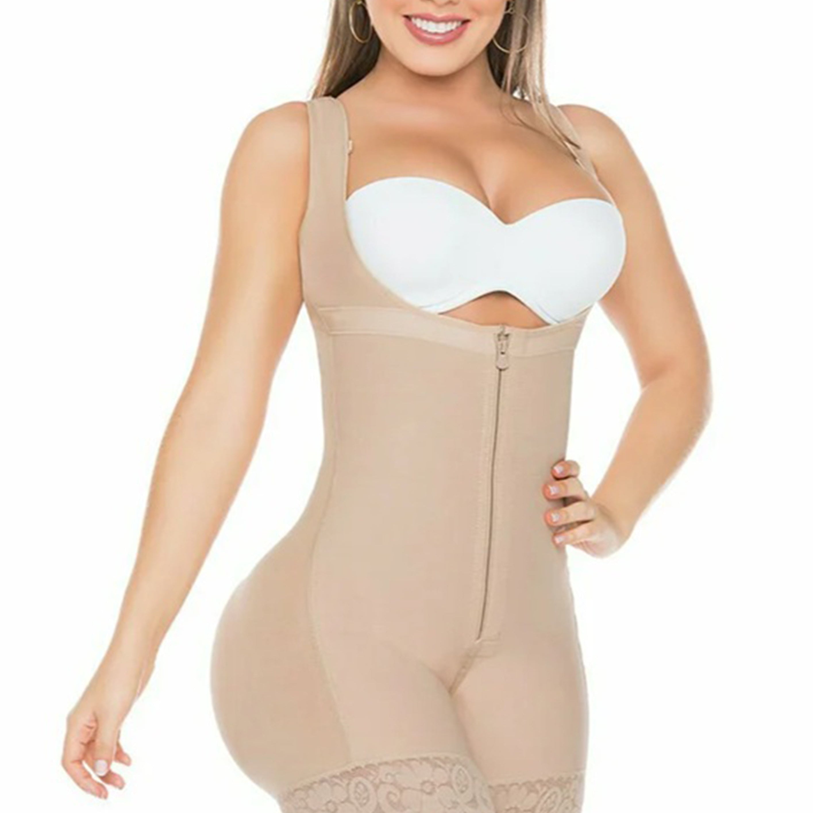 Woman wearing a beige shapewear bodysuit on a white background