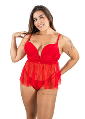 Woman wearing a red lace babydoll lingerie set on a white background