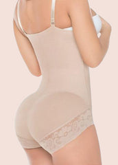 Beige shapewear with lace details on a beige background