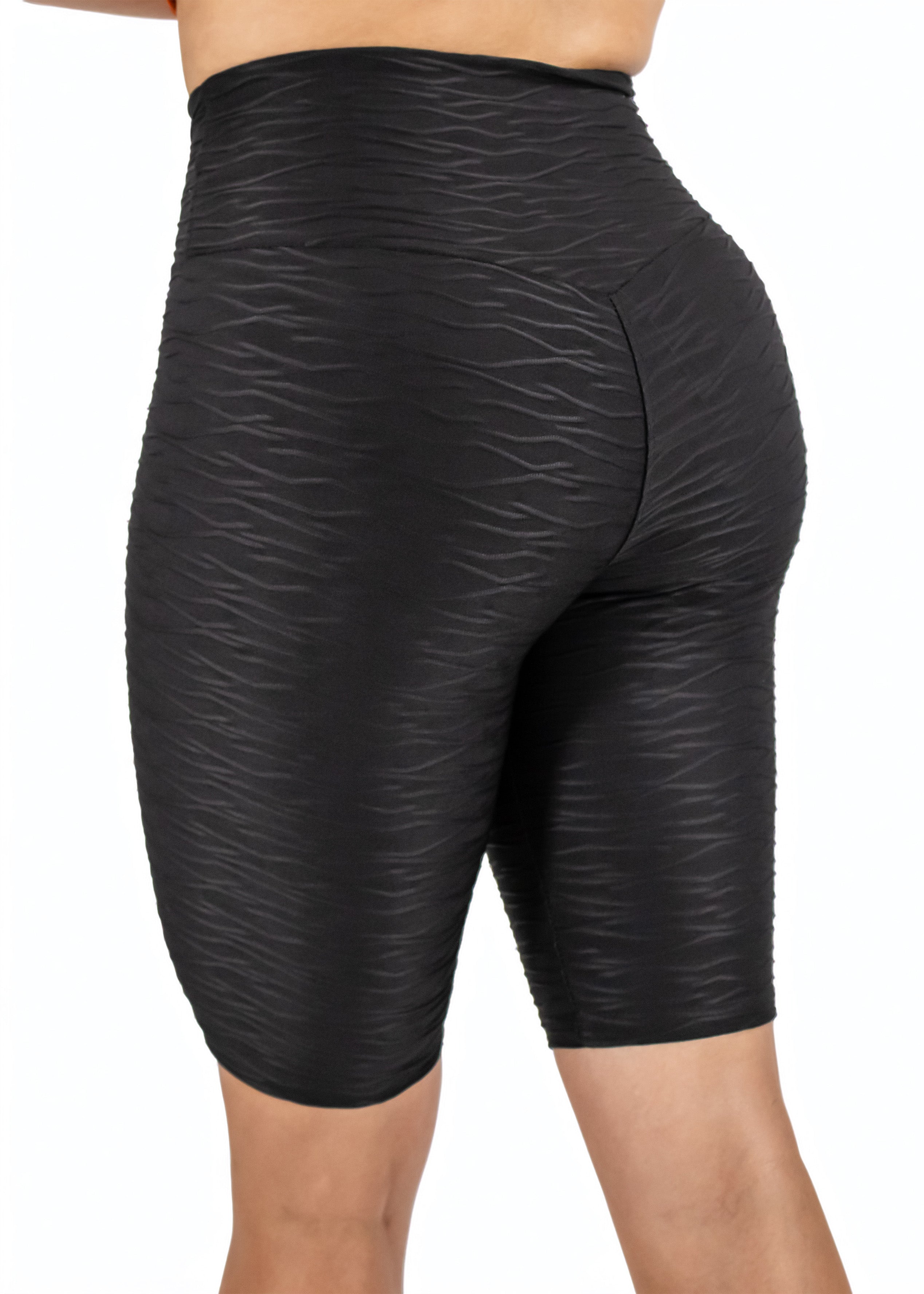 Black patterned bike shorts on a white background