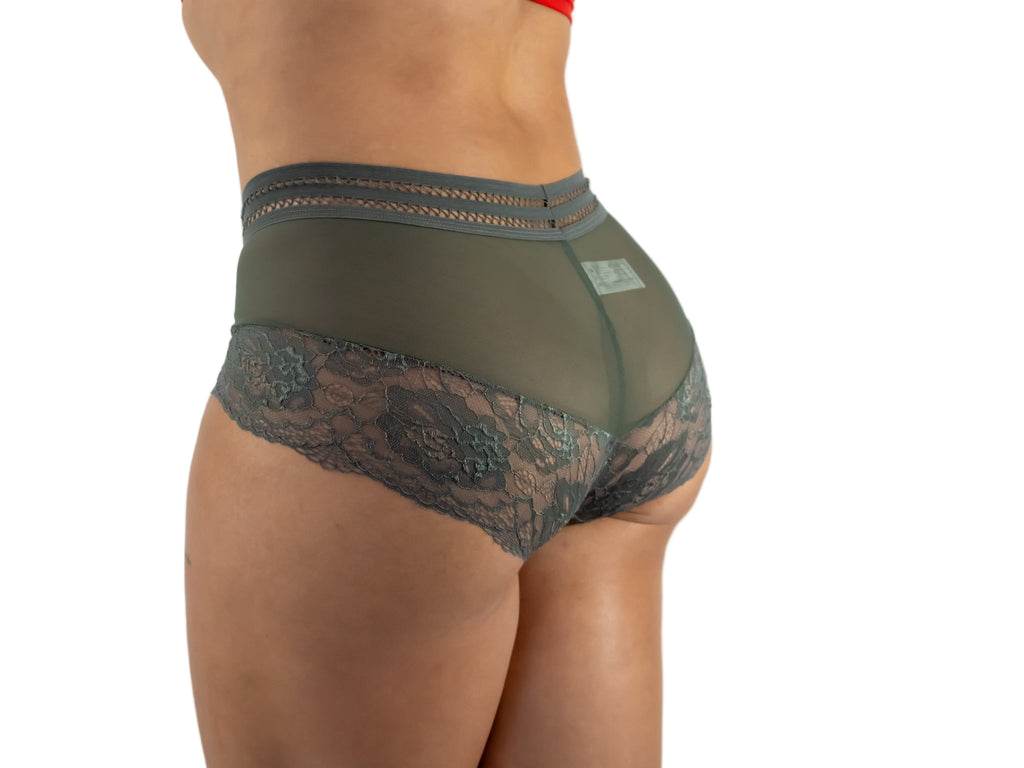 Green lace underwear on a plain background