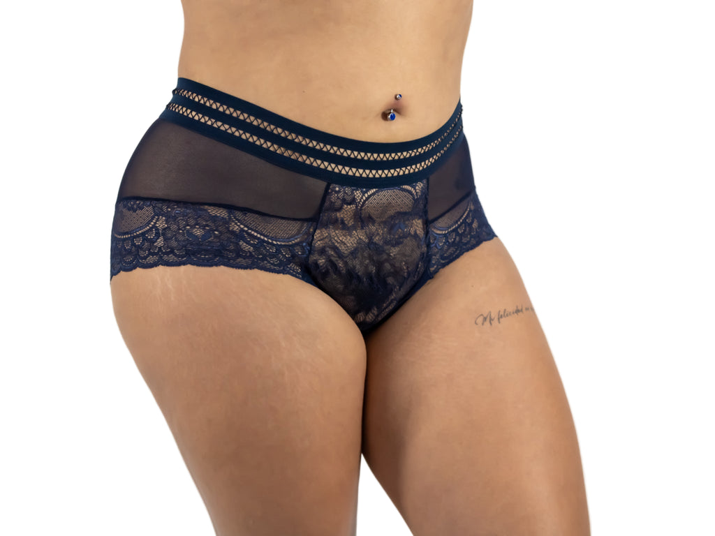 Navy lace underwear worn by a person on a white background