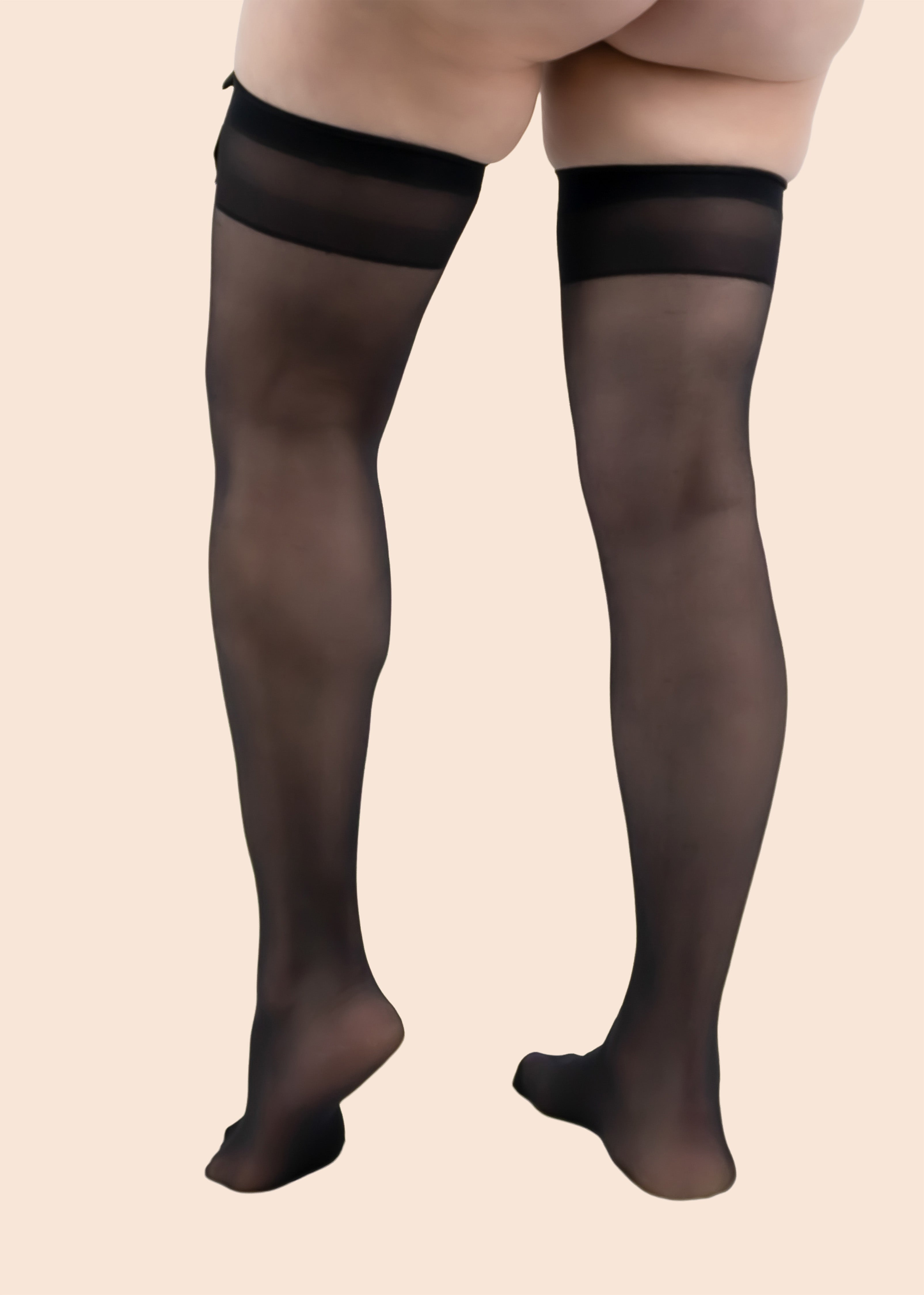 Black sheer stockings on a beige background