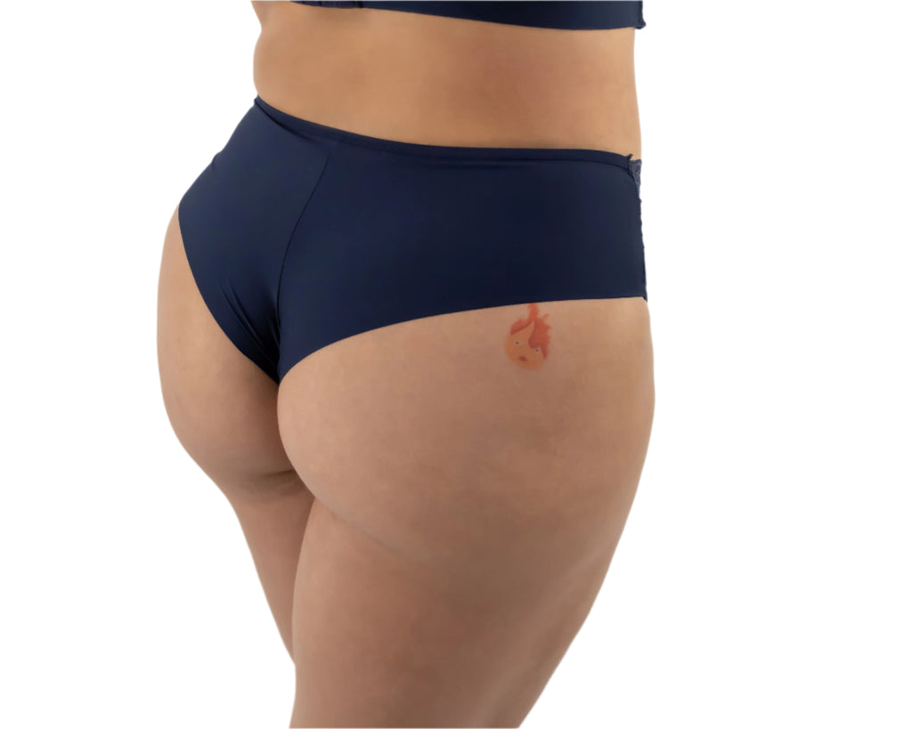 Navy blue underwear worn by a person on a white background