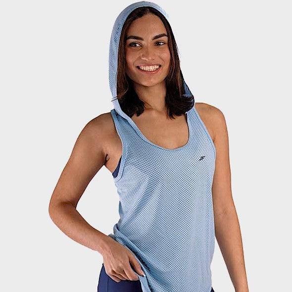 The Layering Sportswear Top with a blue hoodie for a sporty look