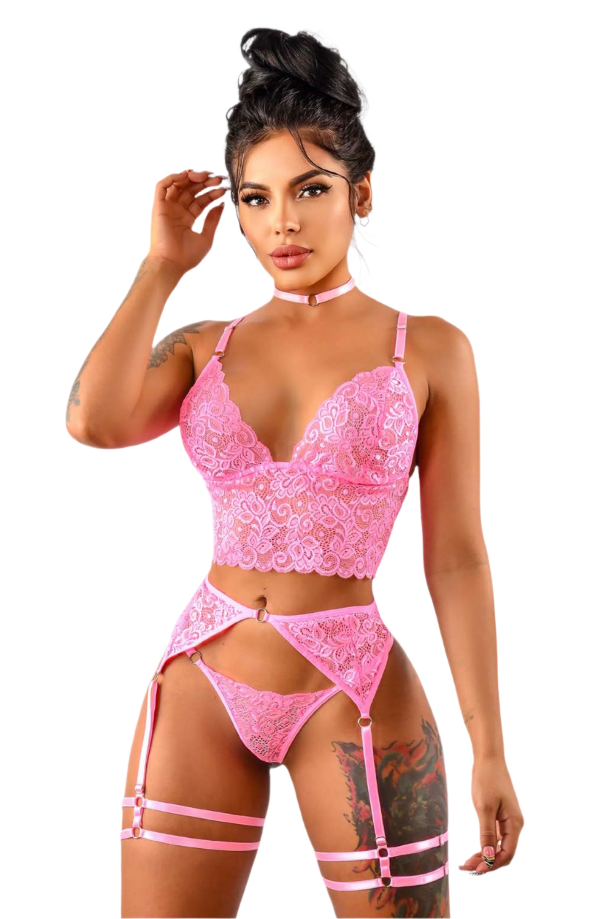 Model wearing a sexy pink three piece bralette, thong and garter belt