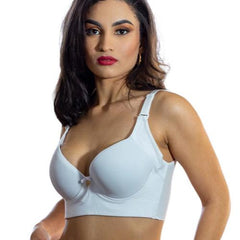 Close-up of a white support bra on a plain background