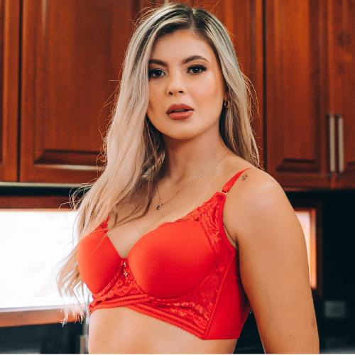 Arysti model wearing a red Modeling Bra