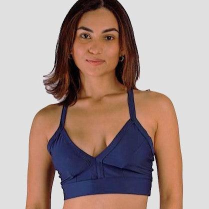 Front view of a woman modeling a blue sportswear bra