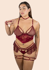 Woman wearing a burgundy babydoll