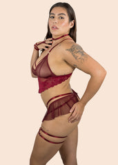 Woman wearing a burgundy babydoll