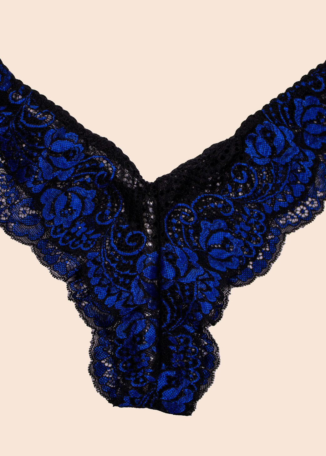 Blue lace lingerie on a beige background