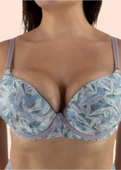 Blue floral bra worn by a model on a beige background
