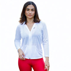 Woman wearing a white shirt and red pants on a white background