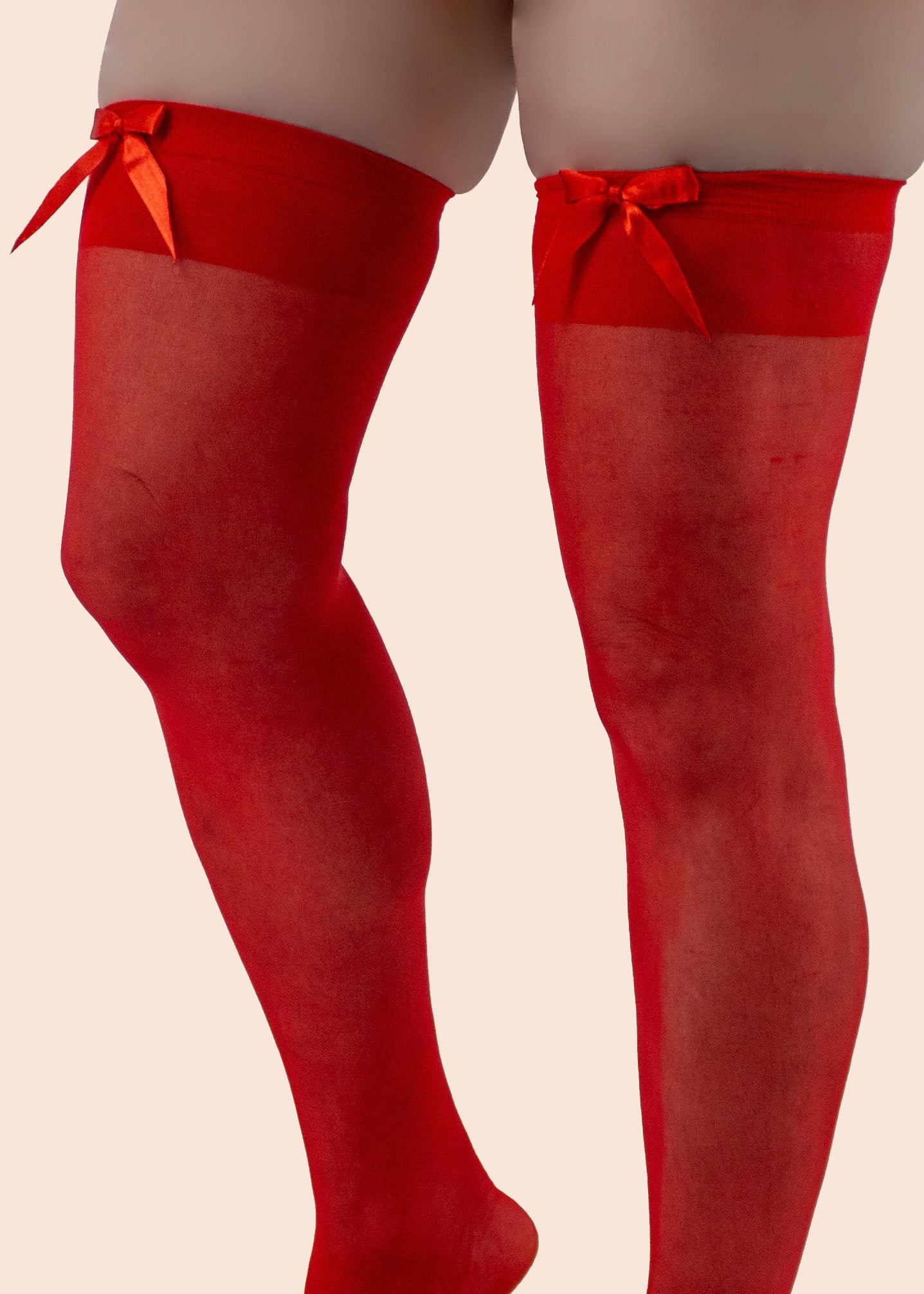 Red tights with bow details on a beige background