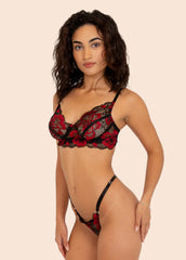 woman wearing a floral red and black lingerie set