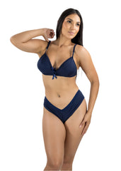 Woman wearing a navy blue bikini set on a white background