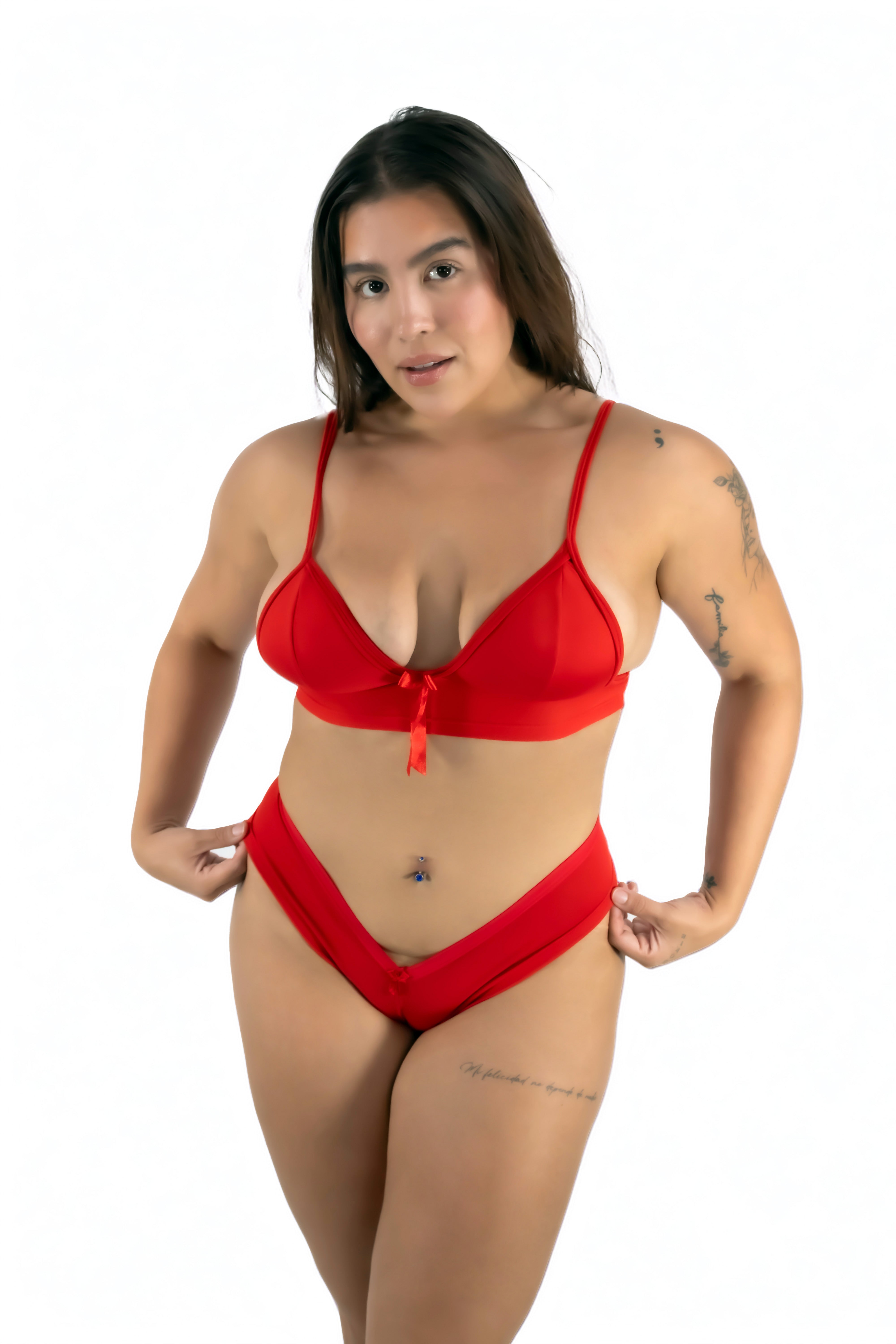 Woman wearing a red bikini on a white background