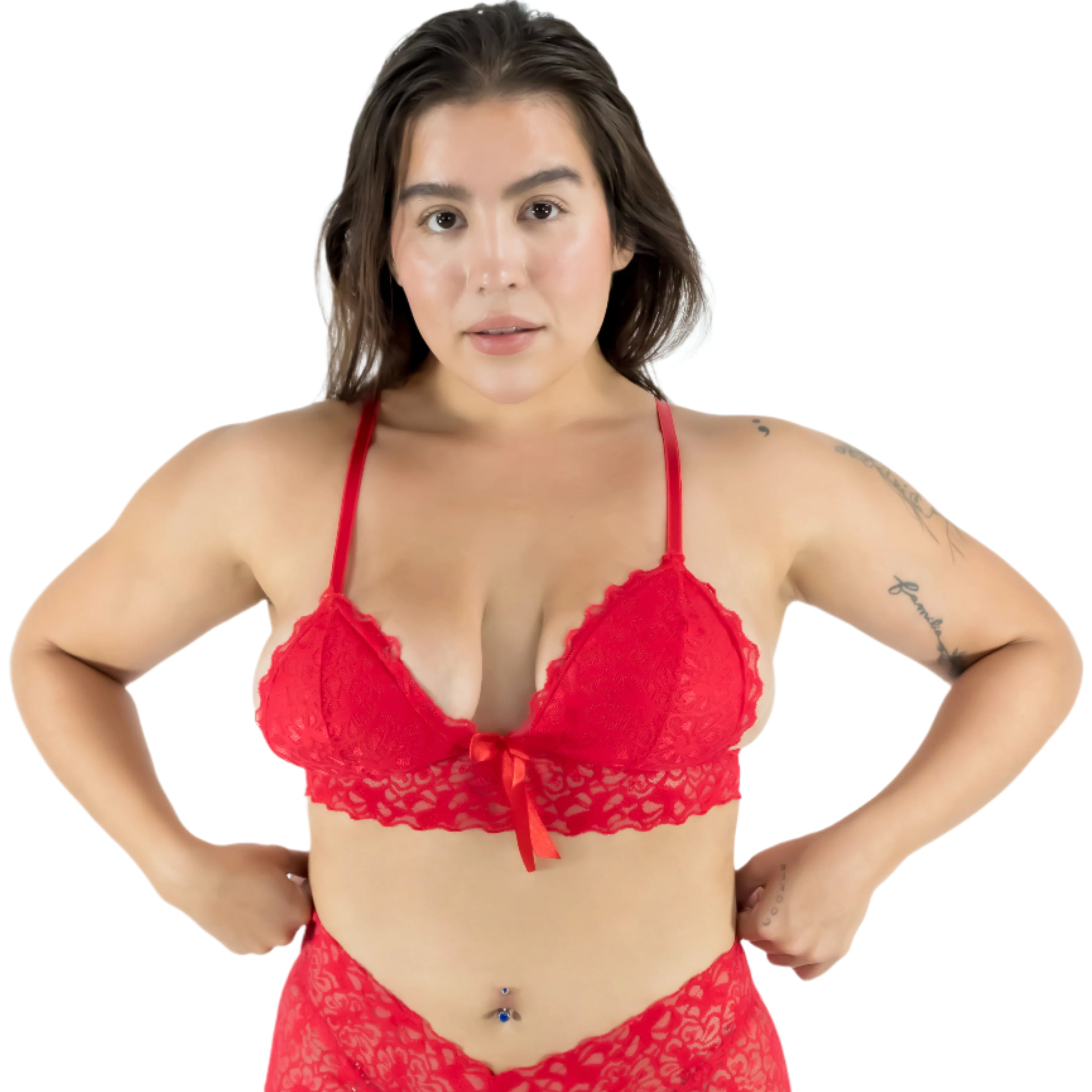 Woman wearing a red lace lingerie set on a white background