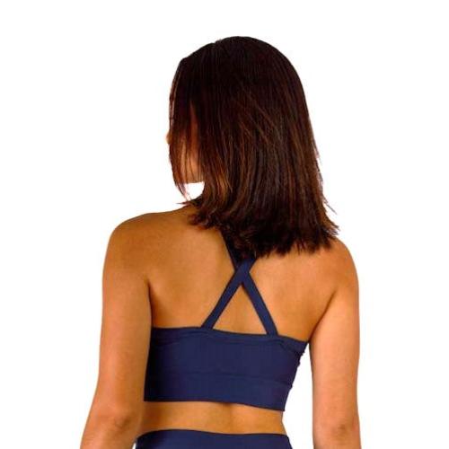 Rear view of a woman in a blue sportswear bra with crisscross straps